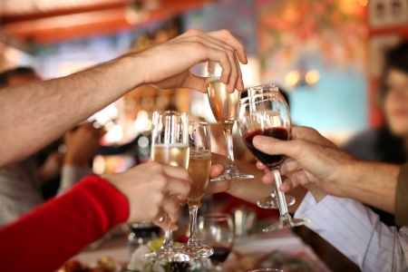 2475817-celebration-hands-holding-the-glasses-of-champagne-and-wine-making-a-toast.jpg